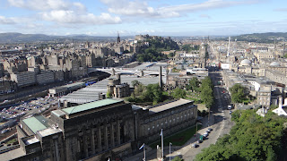 View of Edinburgh from top of Nelson Monument with Edinburgh Castle in the distance