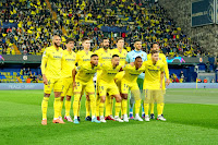 VILLARREAL C. F. Temporada 2021-22. Capoue, Gerard Moreno, Juan Foyth, Raúl Albiol, Pau Torres, Gero Rulli, Dani Parejo. Arnaut Danjuma, Francis Coquelin, Estupiñán y Giovani Lo Celso. VILLARREAL C. F. 1 F. C. BAYERN MÜNCHEN 0 Miércoles 06/04/2022, 21:00 horas. Liga de Campeones de la UEFA, cuartos de final, partido de ida. Villarreal, Castellón, España, estadio de La Cerámica: 21.626 espectadores. GOLES: 1-0: 9’, Danjuma.