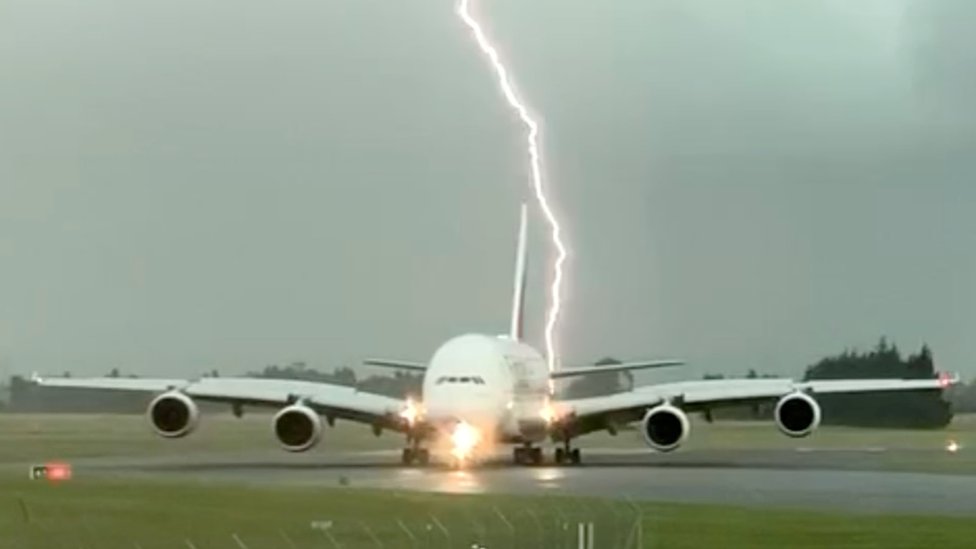 The camera captured the scene of the lightning strike on the plane