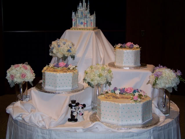 Four tier Cinderella Castle Wedding Cake with the tiers separated over 