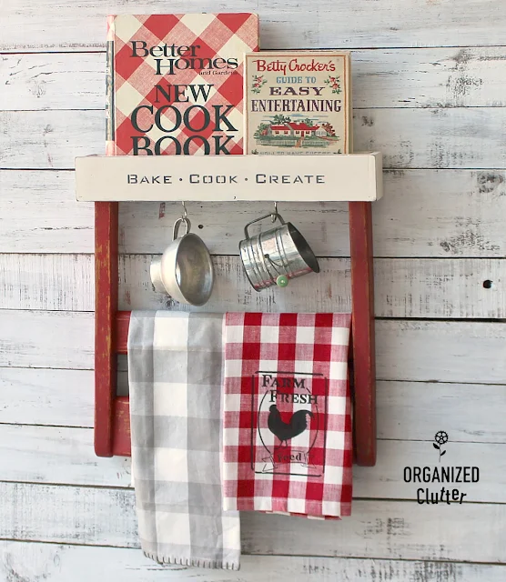 Chair Back Repurposed As Farmhouse Kitchen Decor #chairback #repurpose #repurposed #upcycle #homesteadhousemilkpaint #farmhousekitchen #farmhousestyle #cookbookdisplay #oldsignstencils