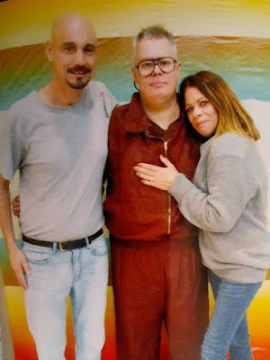 Walter Ogrod, center, poses for a portrait with his brother, Greg Ogrod, and Greg’s fiancée, Mary G. Kelly, in 2019. Photo: Courtesy of the Ogrod Family
