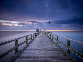 Wooden walkway that stretches into the sea