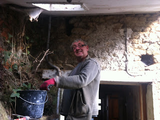 how to patch up an old stone wall in a derelict house in france