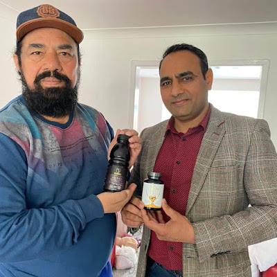 Dr Ashok with Eveda Products