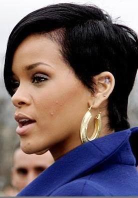 Rihanna ear tattoo