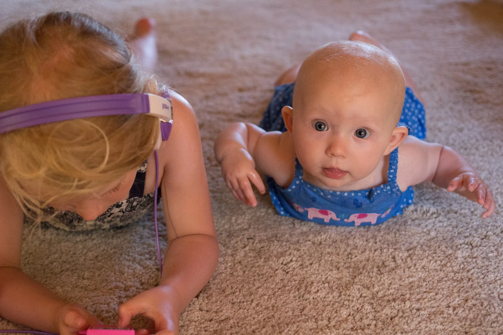 Children on a carpet and cleaning it safely