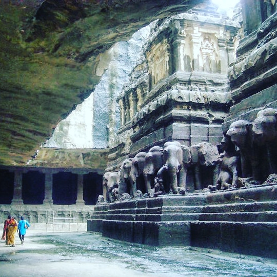 elephant heads carved in rock at kailasa, one of the most beautiful temples in india