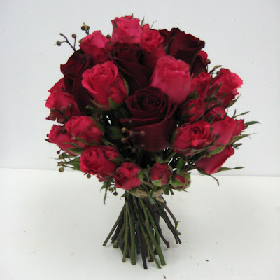 Red roses and baby roses wedding bouquet at 1019 PM