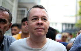 Andrew Brunson arrives at his home in Izmir, Turkey, on July 25. PHOTOGRAPHER: EMRE TAZEGUL/AP PHOTO