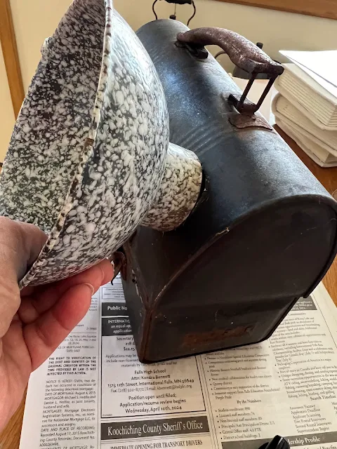 Photo of a funnel used to trace a circle on a lunchbox.