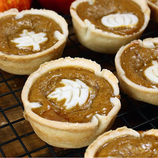 Mini Pumpkin Pies with leaf stamped on top