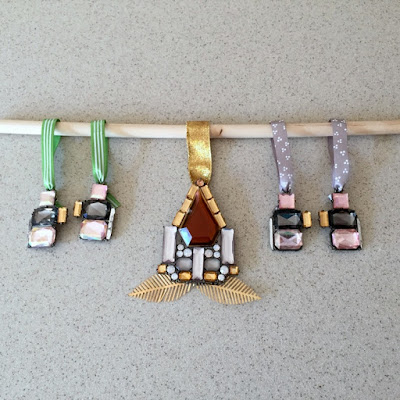 holiday ornaments made from broken jewelry - are those snowmen with mugs of beer?