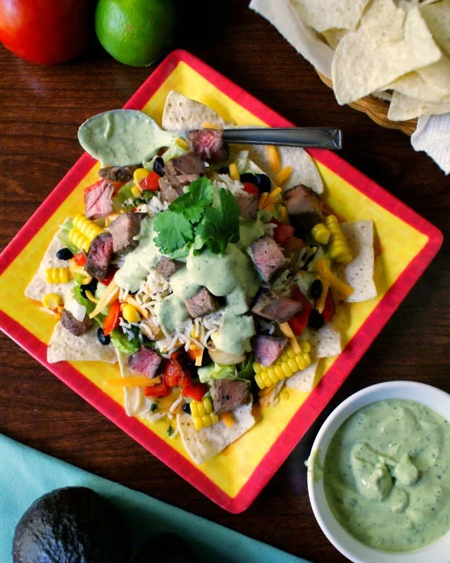 Grilled Steak and Rice Taco Salad with Creamy Avocado Cilantro Dressing | thetwobiteclub.com