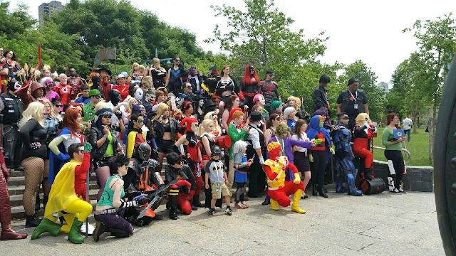 cosplayers on stairs Special Edition NYC DC Comics ensemble