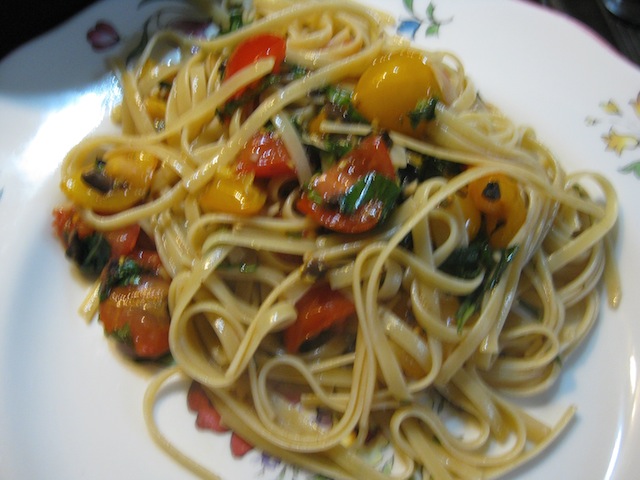 Food Lust People Love: Funky spaghetti is a cross between warm salad and tasty linguine, with tomatoes, olives and basil! Serve it as a main course or side dish.