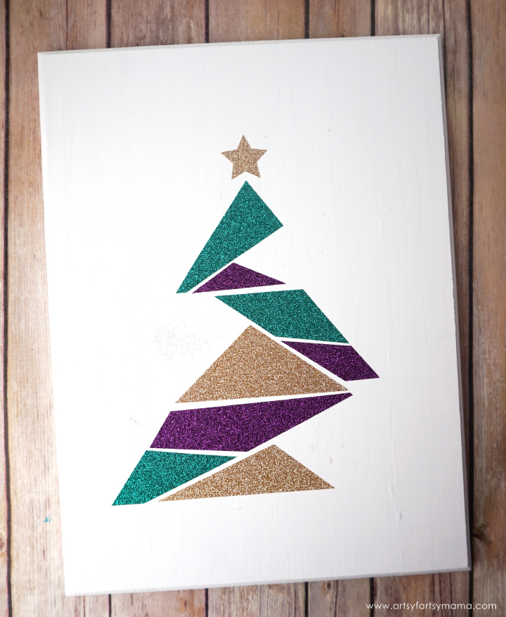 Make this easy DIY Modern Christmas Tree Sign to add some holiday sparkle into your home!