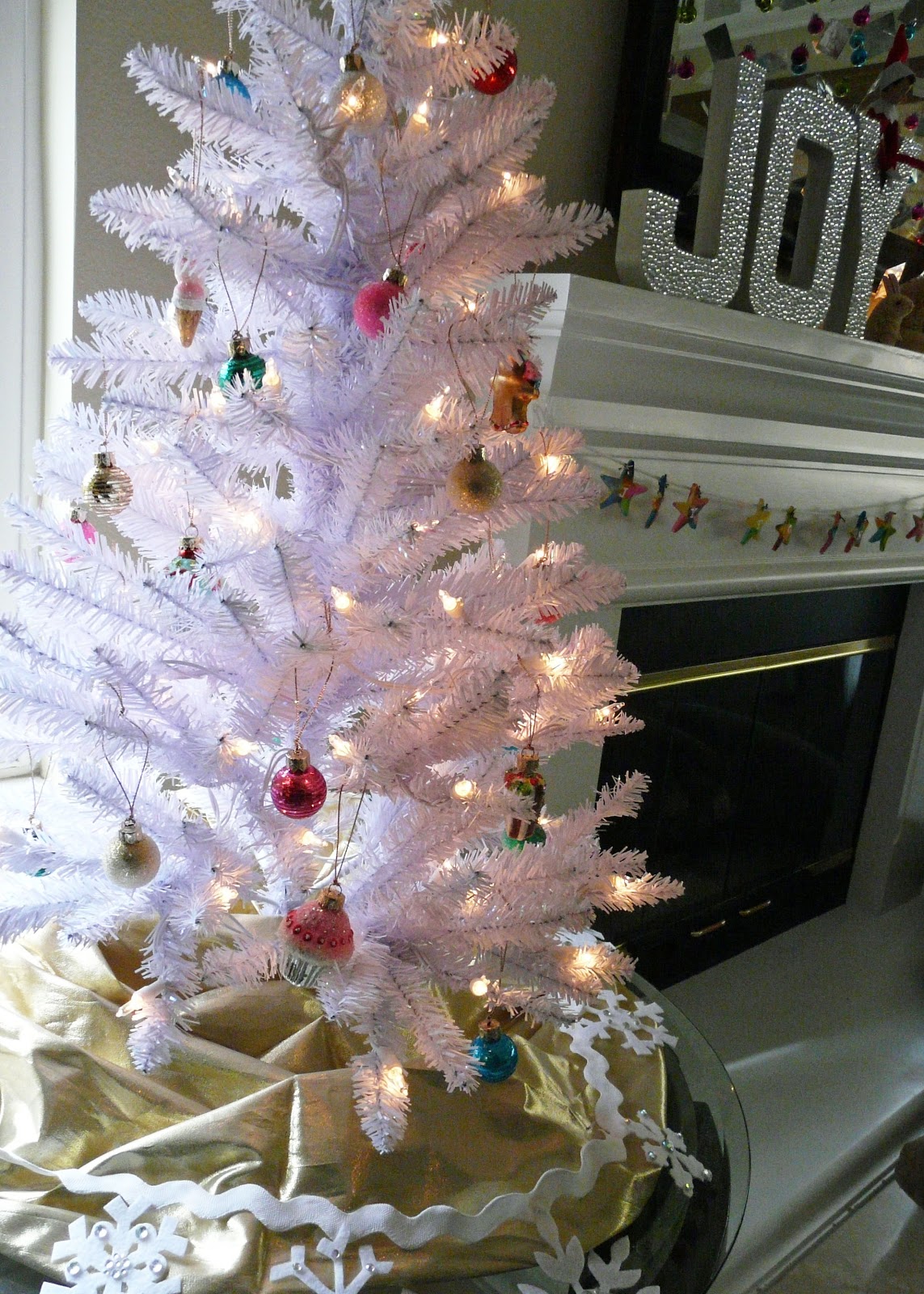 i embraced my inner girl and purchased this mini white tree and candy themed ornaments on deep discount it s the Martha Stewart brand from Macys and i LOVE