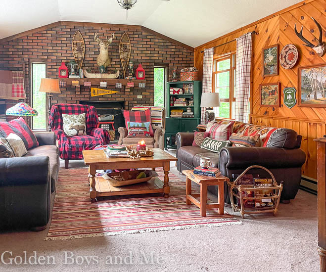 Family room at mountain cabin with gallery wall and paint by numbers - www.goldenboysandme.com