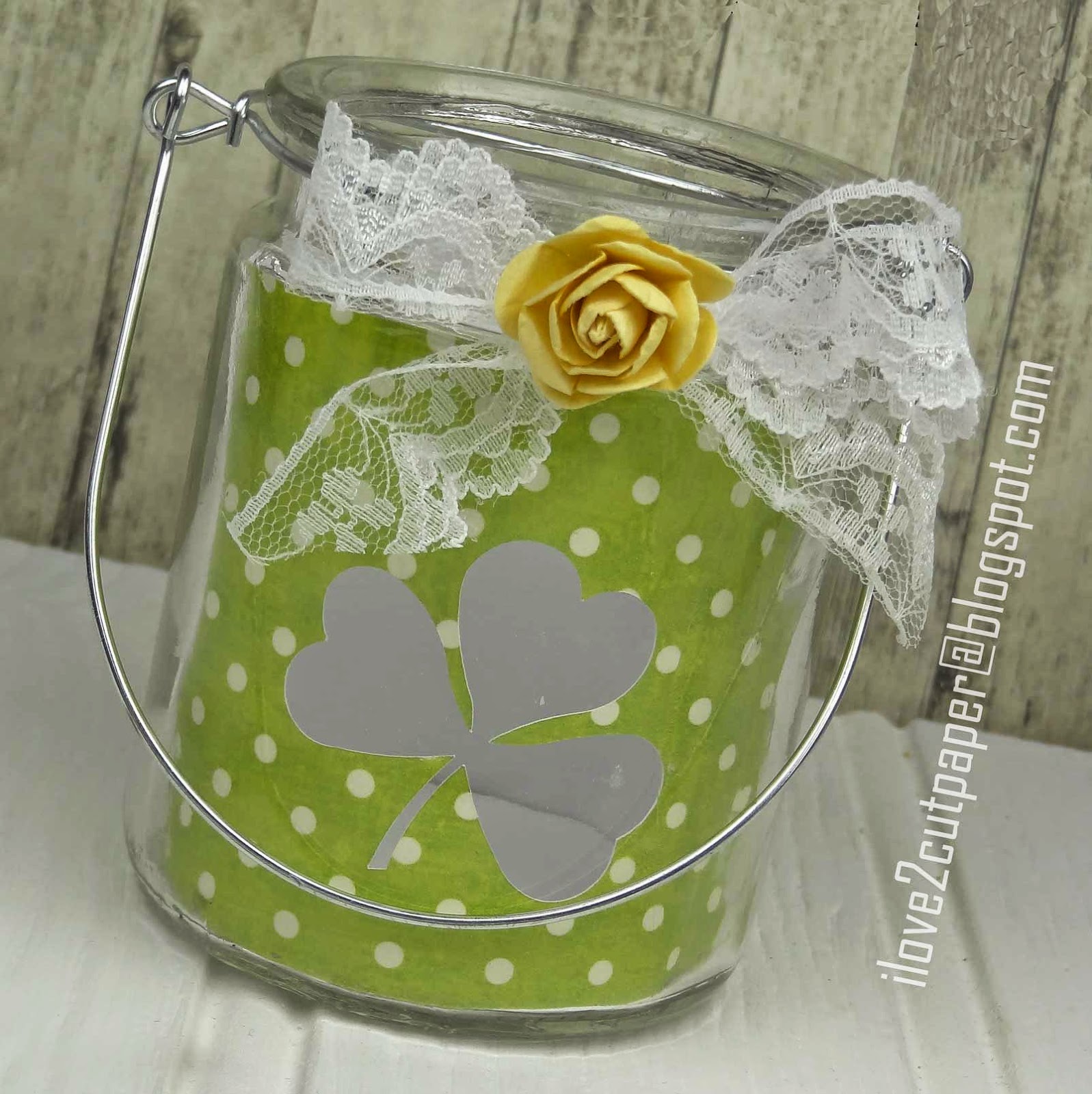 Decorated glass jar with clover