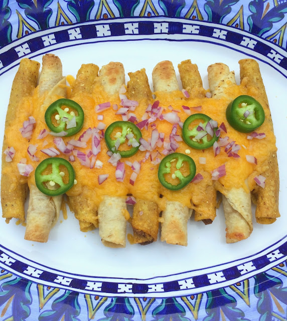 Taquito Recipe - a cheesy, delicious combination of Taquitos and Nachos | www.jacolynmurphy.com