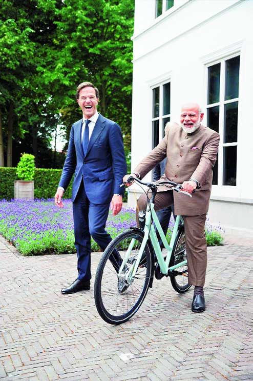 http://www.financialexpress.com/india-news/narendra-modi-gifted-cycle-by-premier-mark-rutte-delighted-pm-takes-to-twitter-shares-photos/738828/