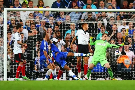 Chelsea player John Obi Mikel scores his side's second goal against Fulham