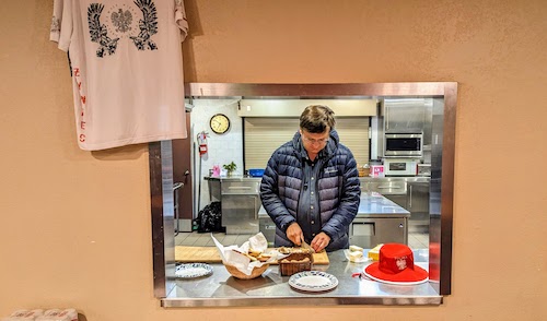 Preparing a post-match meal in the center's kitchen