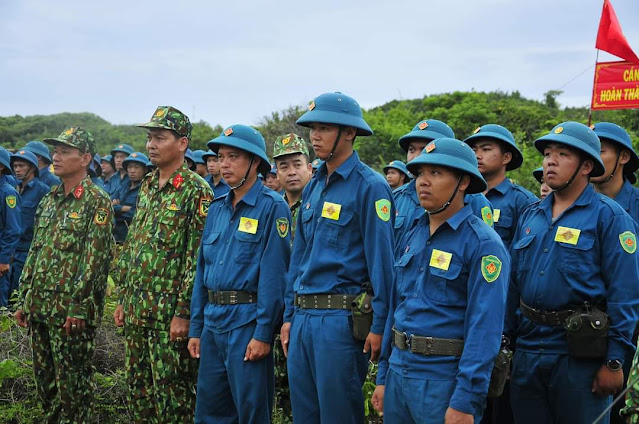 Hiến pháp năm 2013 quy định về Dân quân tự vệ như thế nào ? 