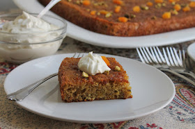 Food Lust People Love: Sweet chewy dried apricots and flavorful roasted pistachios combine with lots of creamy yogurt and butter to create one of the richness cakes you can imagine. A hint of cardamom in the batter is echoed again in the orange-cardamom syrup to finish the cake with a Middle Eastern flair.