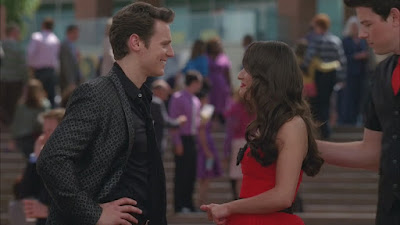 Rachel and Jesse smiling at each other