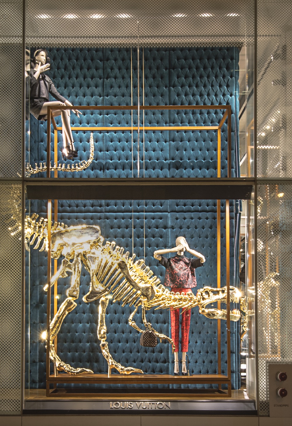 Gilded dinosaur skeletons at Louis Vuitton store in New York