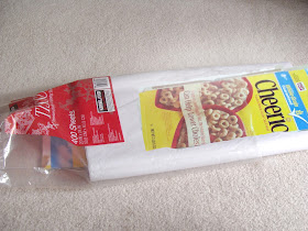 Slide tissue into original bag with cereal box cardboard sleeves