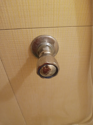 loose shower handle dripping water