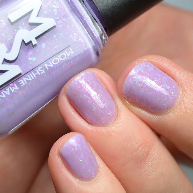 lilac nail polish with aurora shimmer and flakies swatch