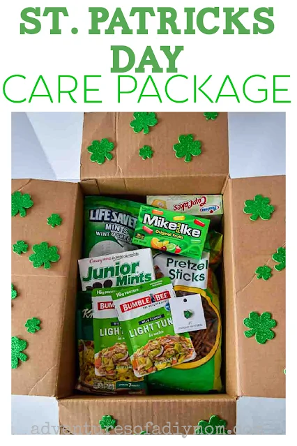 box with shamrock stickers filled with green food items