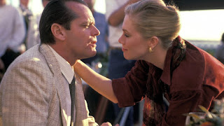 Scene with Jack Nicholson and Kathleen Turner about to kiss