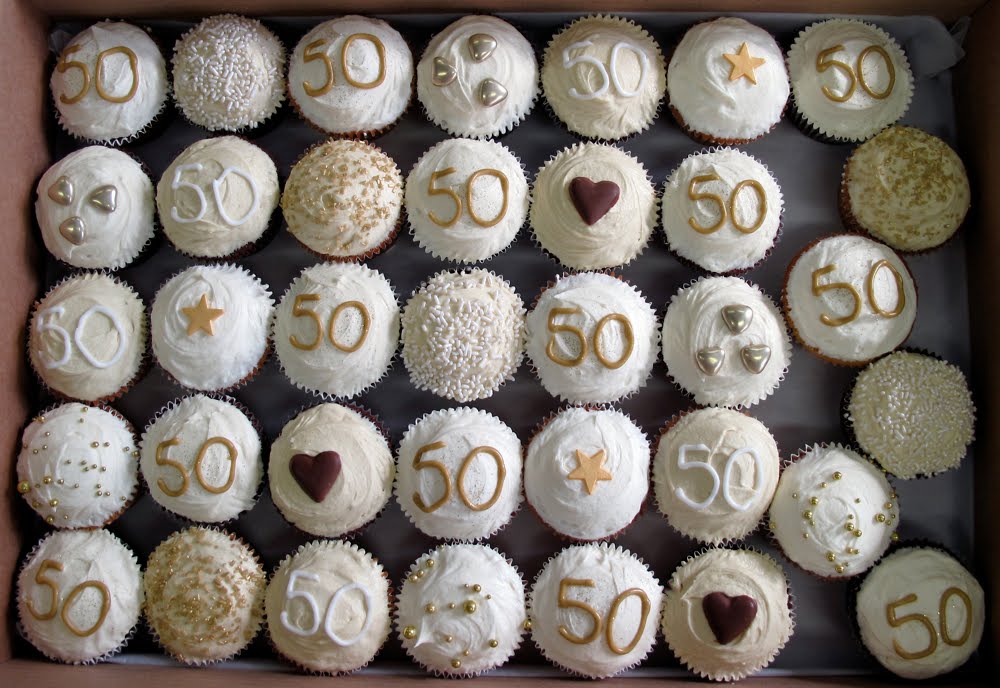 Here's some great golden wedding anniversary cupcakes we did for Nikki a