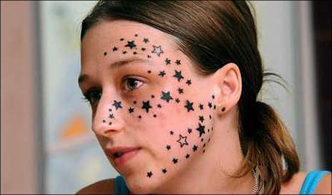 face star tattoo girl. face star tattoo girl.