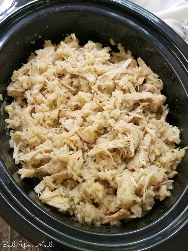 Southern Style Crock Pot Chicken & Rice! An easy slow cooker recipe for a Carolina favorite made with tender stewed chicken and long grain rice. No precooking the chicken and no instant rice – everything cooks in the crock pot!