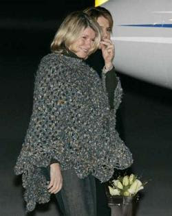 Martha Stewart wearing the Poncho of Shame