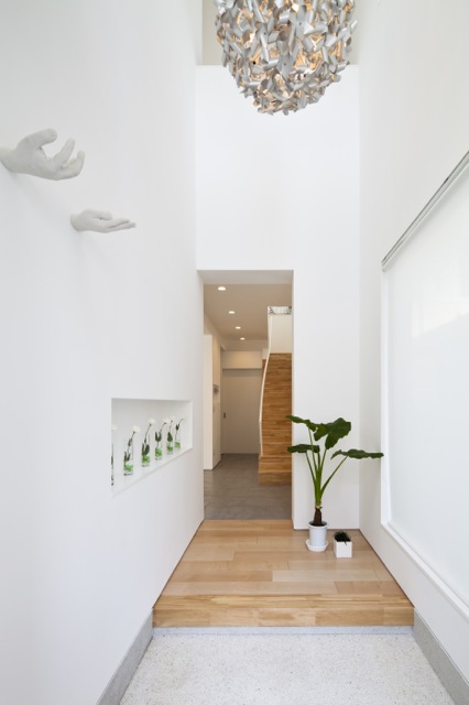 Narrow hallway and minimalist interiors 