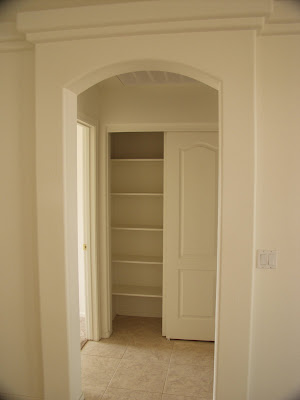 Linen Closet with Shelving Throughout