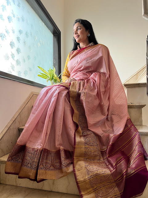 Pink saree with wine zari border