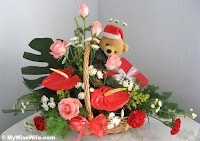 send christmas flower basket