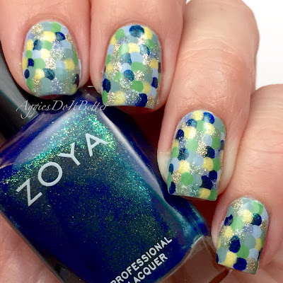 http://www.aggiesdoitbetter.com/2015/02/fish-scale-nails-for-alys-birthday.html