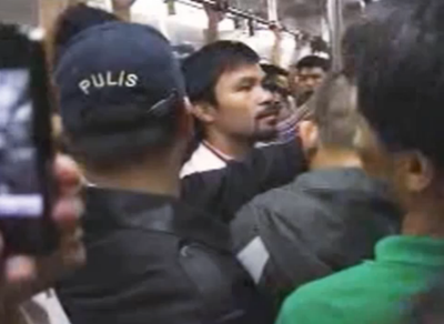 Manny Pacquiao rides MRT