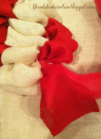 alt="Burlap Candy Cane Wreath Tutorial using Pool Noodle"