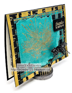 Linda Vich Creates: Pleasant Pheasants Meet Buffalo Check. Gold embossed pheasants nestle on a plaid background atop a card front embossed with the Woodland embossing folder to give the card added texture and interest.
