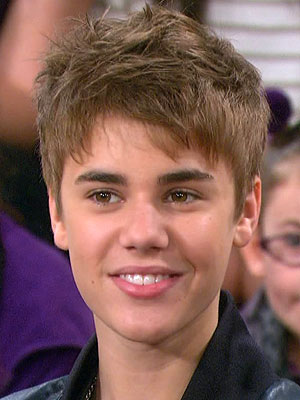 pics of justin bieber new haircut 2011. new justin bieber songs 2011.